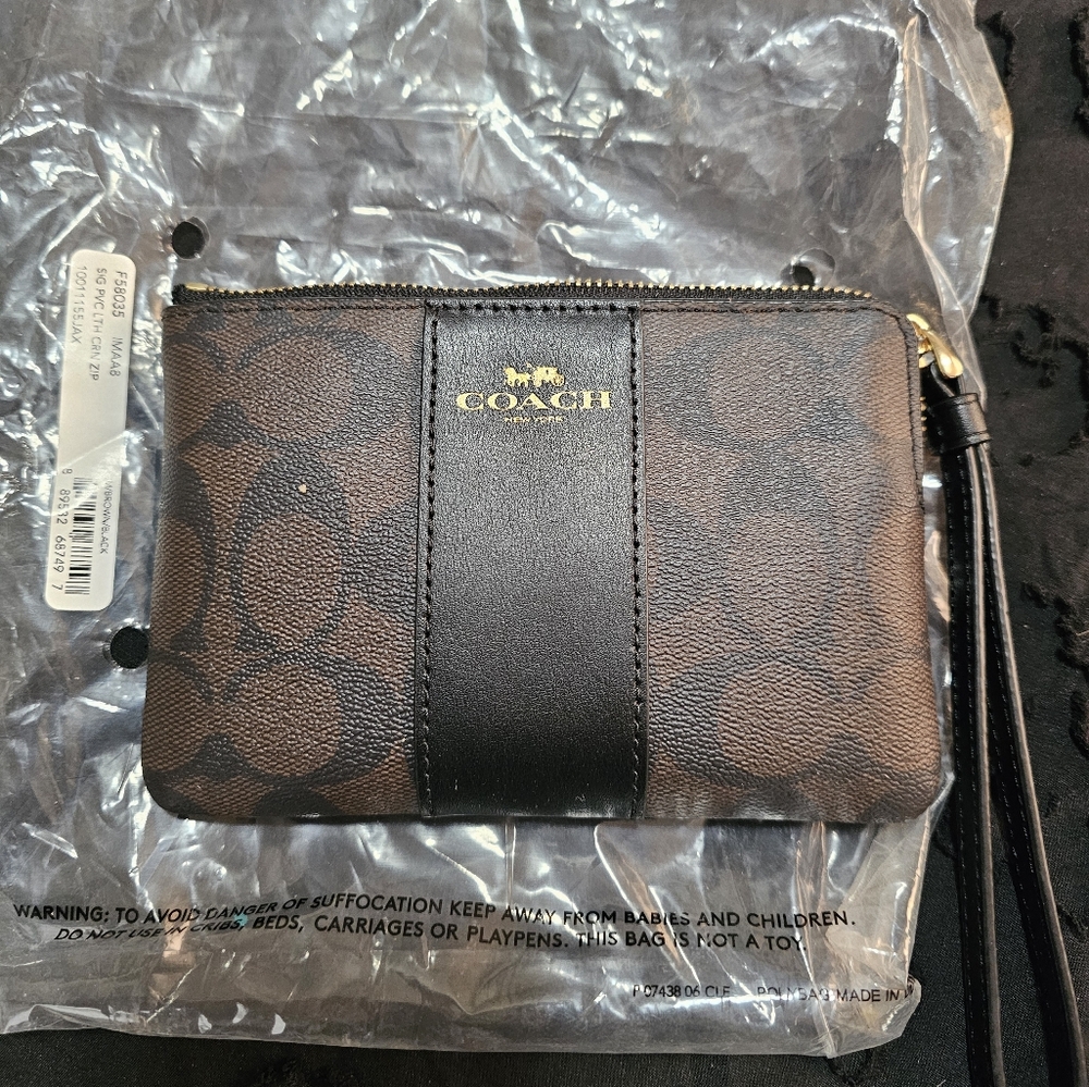 Brand new Coach wristlet